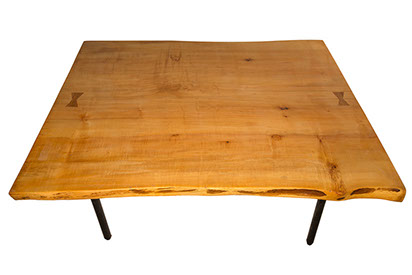 A collection of solid wood live edge coffee tables. Most tables have a rustic or industial style. 